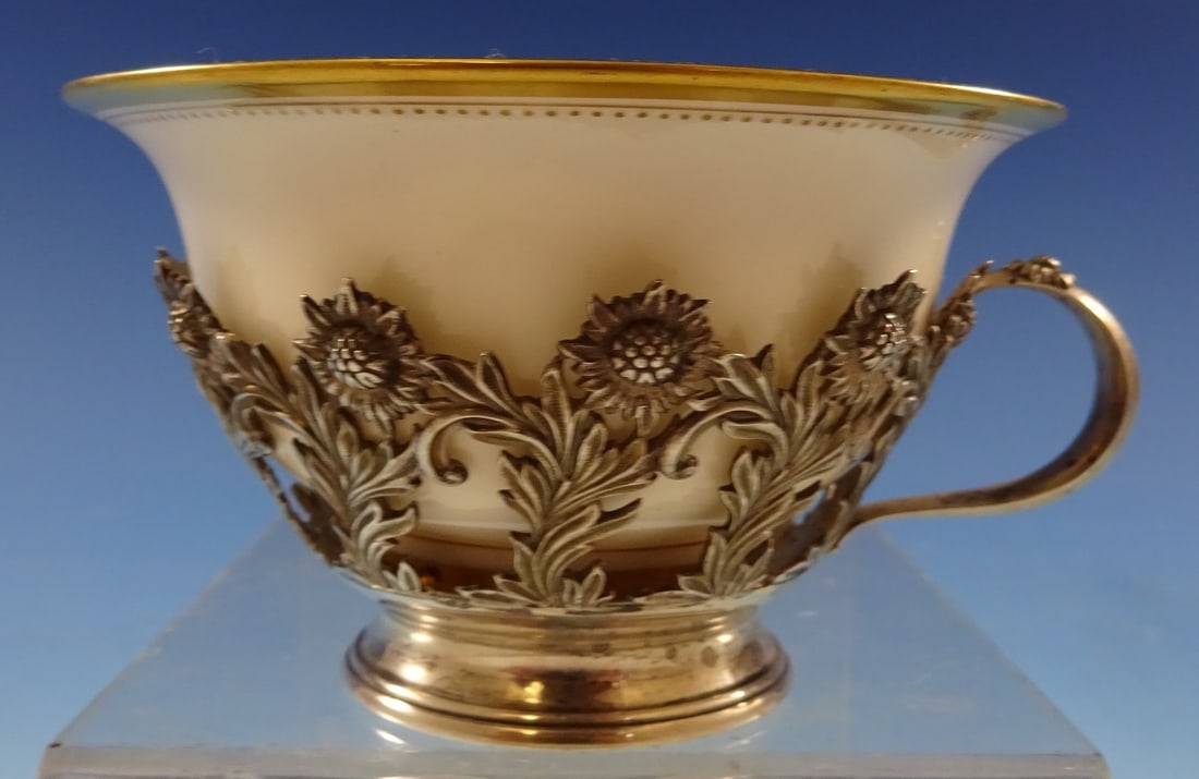 Tiffany & Co Chrysanthemum Sterling Silver Tea Cup with Lenox Liner: Tiffany & Co Chrysanthemum Sterling Silver Tea Cup with Lenox Liner This exquisite tea cup from Tiffany & Co. features the stunning Chrysanthemum pattern, crafted from high-quality sterling silver. Th