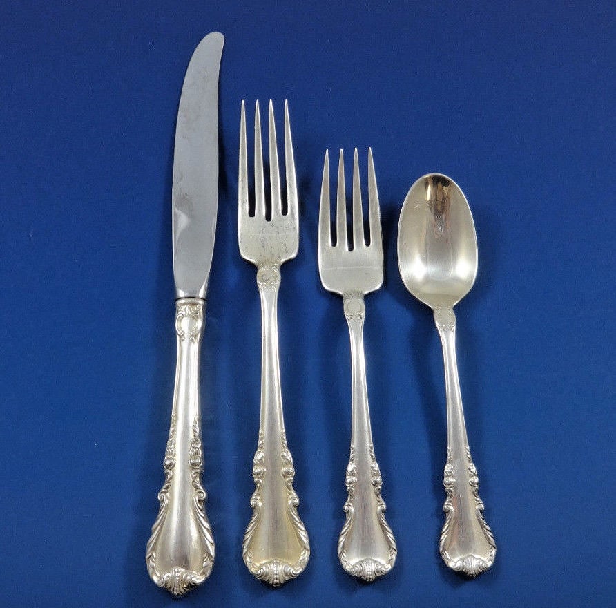 Wallace Melanie Sterling Silver Flatware Set 32 Pieces with Storage Chest: Wallace Melanie Sterling Silver Flatware Set 32 Pieces with Storage Chest Enhance your dining experience with the elegant Melanie by Wallace Sterling Silver Dinner Flatware Set. This exquisite collect