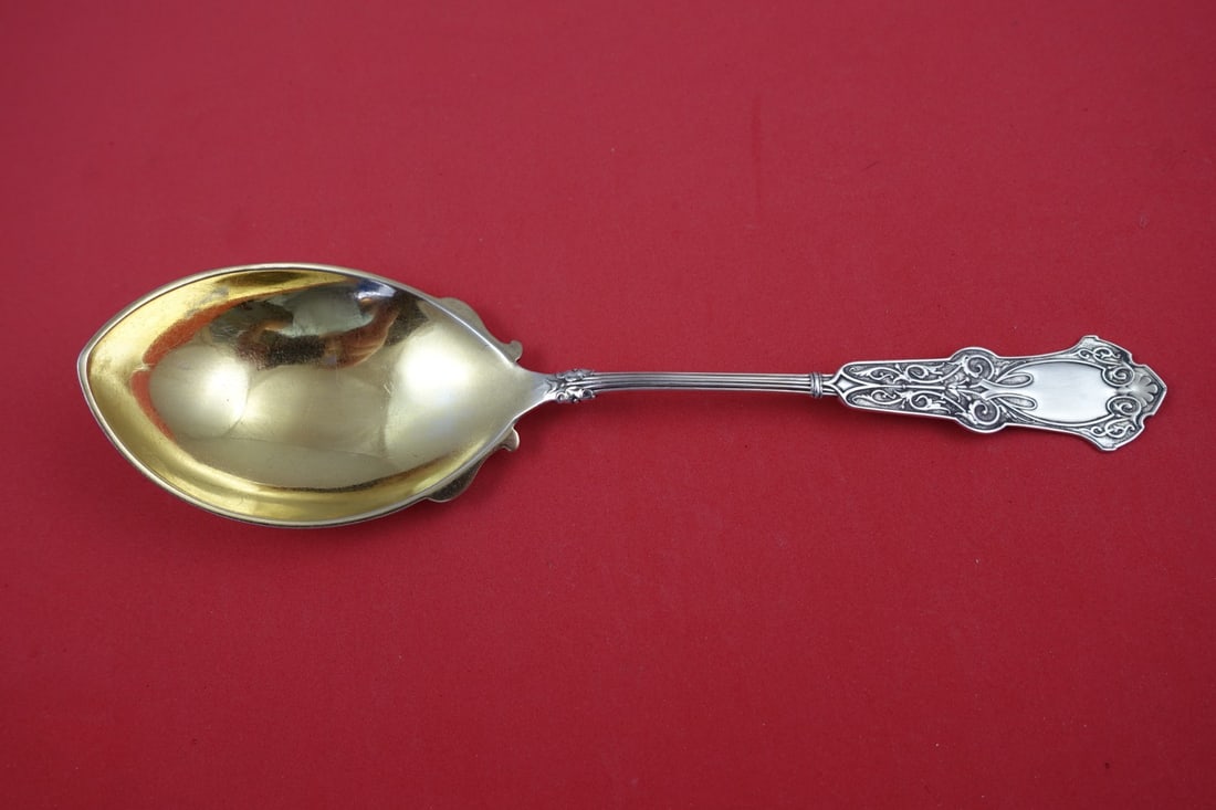 Whiting Alhambra Sterling Silver Gold Washed Berry Spoon 9 1/4": Whiting Alhambra Sterling Silver Gold Washed Berry Spoon 9 1/4" This exquisite Alhambra serving spoon, crafted by Whiting, showcases a classic design from the late 19th century. Made of sterling silve