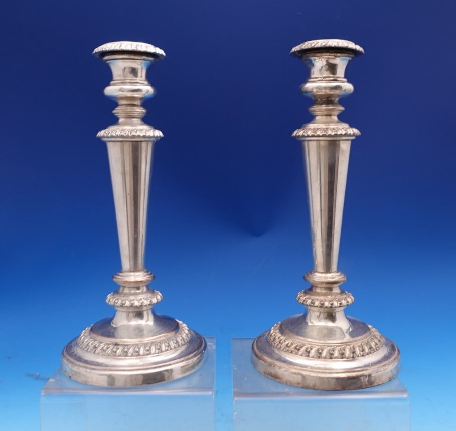 Sheffield Silver on Copper Candlestick Pair 10.5 Inches Tall: Sheffield Silver on Copper Candlestick Pair 10.5 Inches Tall This exquisite pair of candlesticks features a stunning silver on copper composition, crafted in Sheffield, England. Standing at 10 1/2" ta