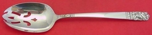 Oneida Casa Grande Sterling Silver Slotted Serving Spoon 8 1/4": Oneida Casa Grande Sterling Silver Slotted Serving Spoon 8 1/4" This elegant serving spoon showcases the exquisite Casa Grande pattern by Oneida. Crafted from fine sterling silver, this slotted spoon