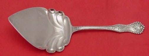 Dominick & Haff Charles II Sterling Silver Pie Server 8 5/8": Dominick & Haff Charles II Sterling Silver Pie Server 8 5/8" This exquisite pie server from Dominick & Haff showcases the elegant Charles II pattern, a testament to fine craftsmanship from the late 19