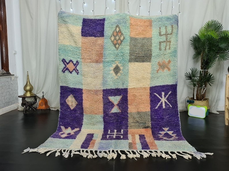 Authentic Handmade Moroccan Berber Rug 8 x 5 Feet Wool: Authentic Handmade Moroccan Berber Rug 8 x 5 Feet Wool Experience the charm of authentic craftsmanship with this elegant handmade Moroccan Berber rug, featuring traditional Berber symbols and designs.