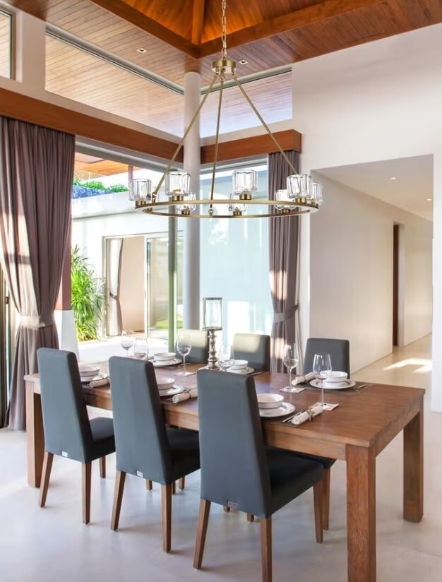 Cadence 9 Light Satin Gold Chandelier with Glass Shades 36 Inch: Cadence 9 Light Satin Gold Chandelier with Glass Shades 36 Inch This farmhouse-style chandelier features a satin gold metal frame and nine glass shades, offering both upwards and downwards light direc