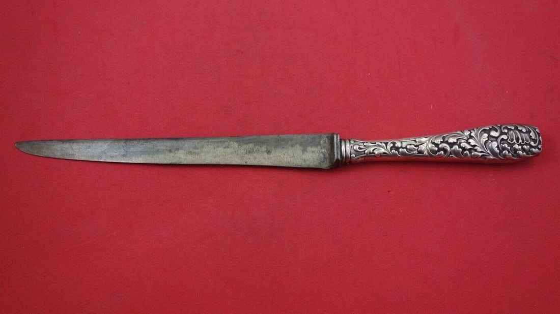 Gorham Sterling Silver Number 70 Roast Carving Knife 12.5": Gorham Sterling Silver Number 70 Roast Carving Knife 12.5" This exquisite roast carving knife is crafted from sterling silver by Gorham, featuring the elegant Number 70 pattern. Measuring 12 1/2 inche