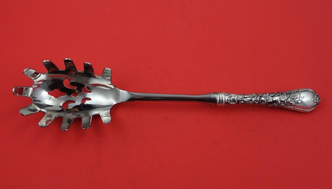 Durgin-Gorham Dauphin Sterling Silver Pasta Server 11 Inch: Durgin-Gorham Dauphin Sterling Silver Pasta Server 11 Inch This exquisite pasta server from the Dauphin pattern by Durgin-Gorham is a stunning addition to any dining collection. Crafted from high-qual