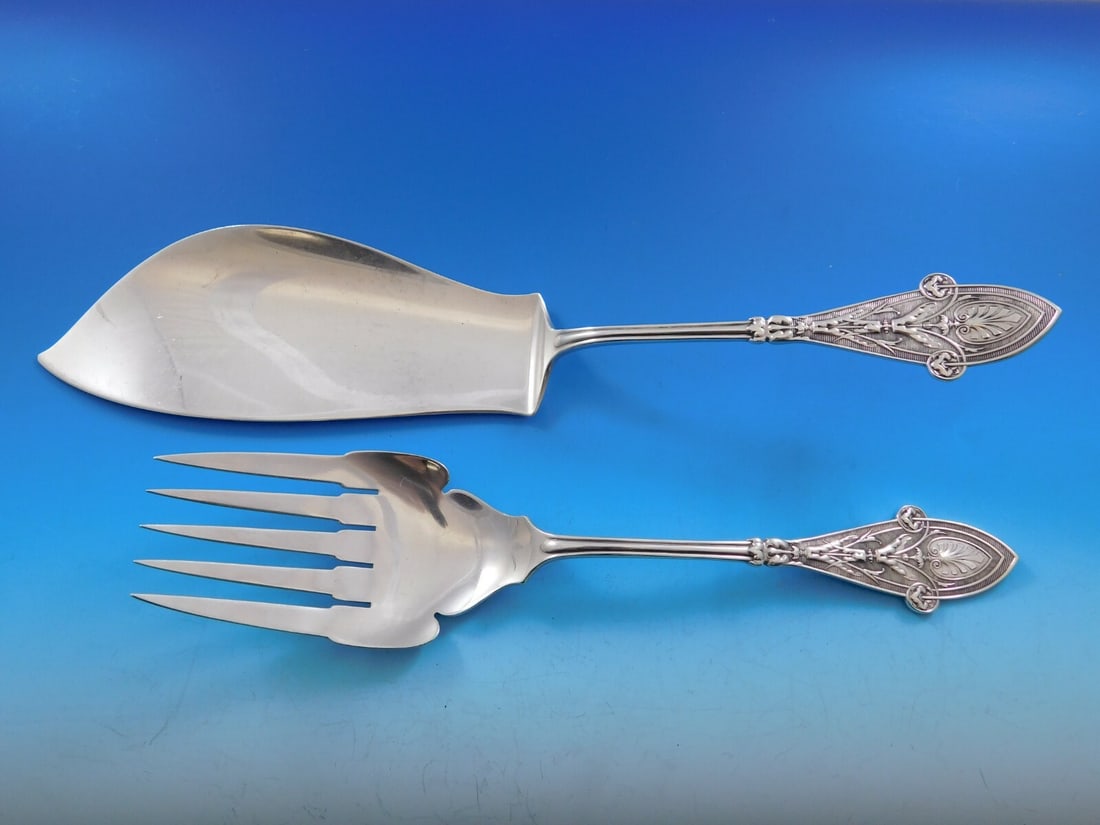 Tiffany & Co. Italian Sterling Silver Fish Serving Set 2pc: Tiffany & Co. Italian Sterling Silver Fish Serving Set 2pc Enhance your dining experience with this exquisite 2-piece fish serving set from Tiffany & Co., crafted in luxurious sterling silver. This se