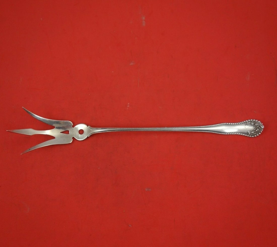 Gorham Lancaster Sterling Silver 9.5 Inch Lettuce Fork: Gorham Lancaster Sterling Silver 9.5 Inch Lettuce Fork Elevate your dining experience with this exquisite 9 1/2" serving lettuce fork from the Lancaster pattern by Gorham. Crafted from high-quality st