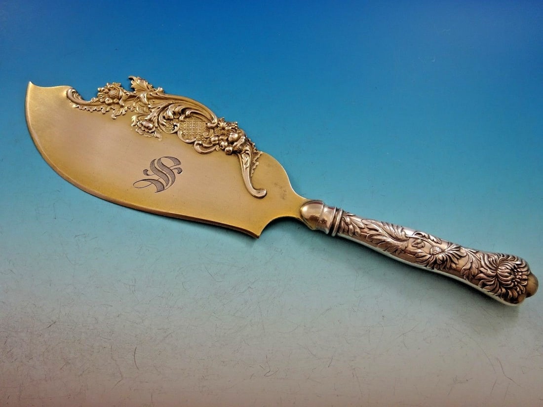 Shiebler Flora Sterling Silver Ice Cream Server 12 inch Gold Washed: Shiebler Flora Sterling Silver Ice Cream Server 12 inch Gold Washed Presenting a stunning antique ice cream server from the renowned Flora pattern by Shiebler, crafted from premium sterling silver. Th