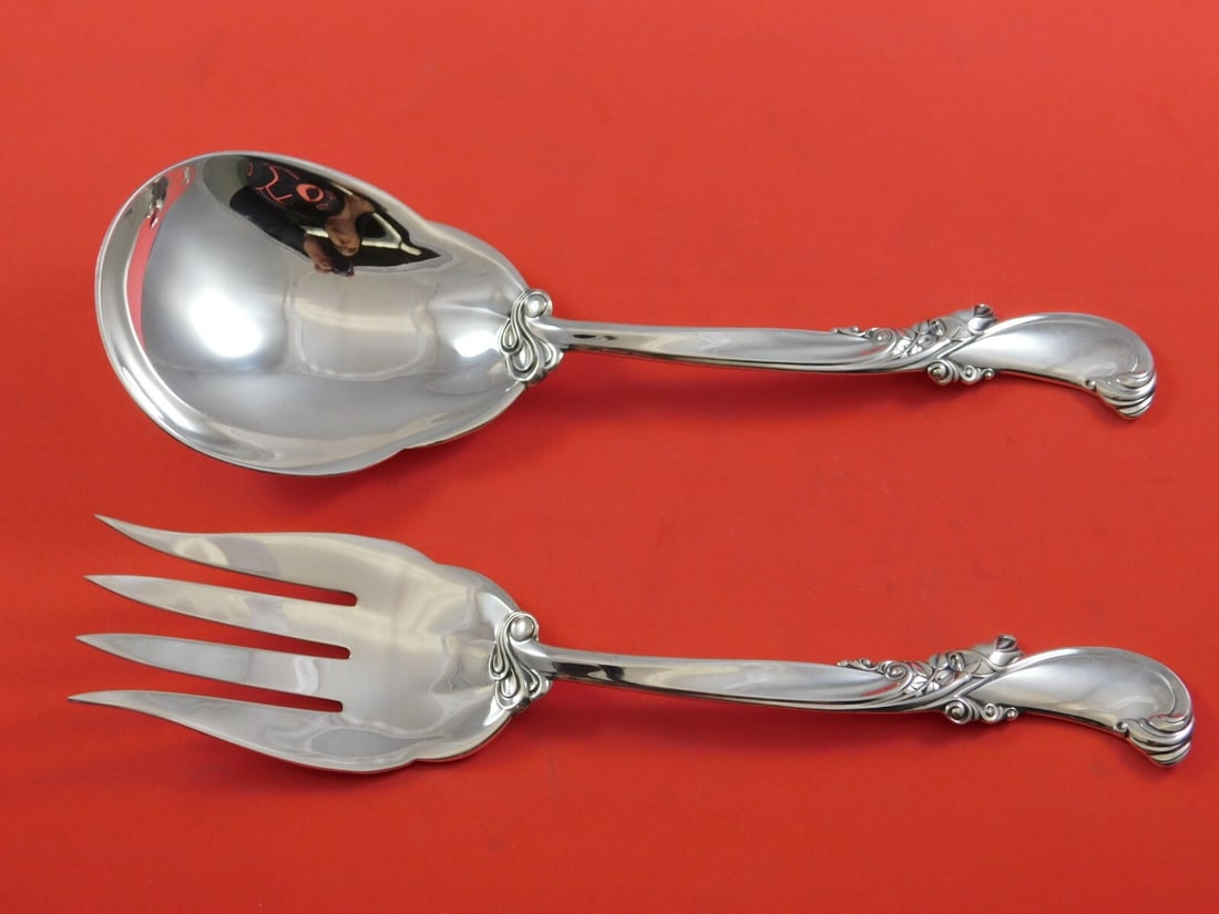Wallace Sterling Silver Salad Serving Set 2pc Waltz of Spring 9": Wallace Sterling Silver Salad Serving Set 2pc Waltz of Spring 9" Enhance your dining experience with this exquisite 2-piece salad serving set from Wallace, featuring the elegant Waltz of Spring patter