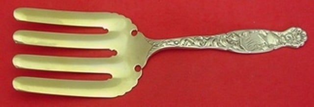 Whiting Heraldic Sterling Silver Gold Washed Asparagus Fork 9.5": Whiting Heraldic Sterling Silver Gold Washed Asparagus Fork 9.5" This elegant asparagus fork features the distinguished Heraldic pattern by Whiting, crafted from high-quality sterling silver. The fork