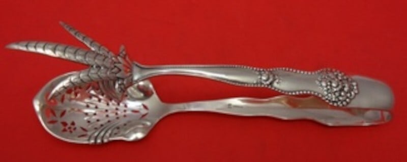 Mount Vernon Adolphus Sterling Silver Ice Tong Flower Design 6.5": Mount Vernon Adolphus Sterling Silver Ice Tong Flower Design 6.5" Elevate your serving experience with the Adolphus Sterling Silver Ice Tong by Mount Vernon. This exquisite piece features a delicate p