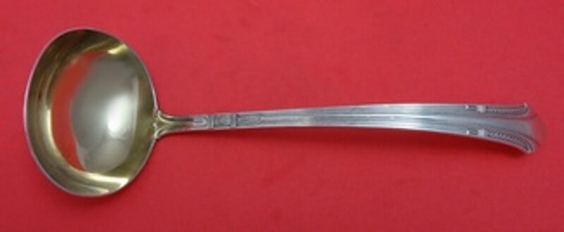Gorham Shamrock V Sterling Silver Gravy Ladle Gold Wash 6 3/4": Gorham Shamrock V Sterling Silver Gravy Ladle Gold Wash 6 3/4" This exquisite gravy ladle from the Shamrock V pattern by Gorham is crafted from heirloom quality sterling silver with a stunning gold wa