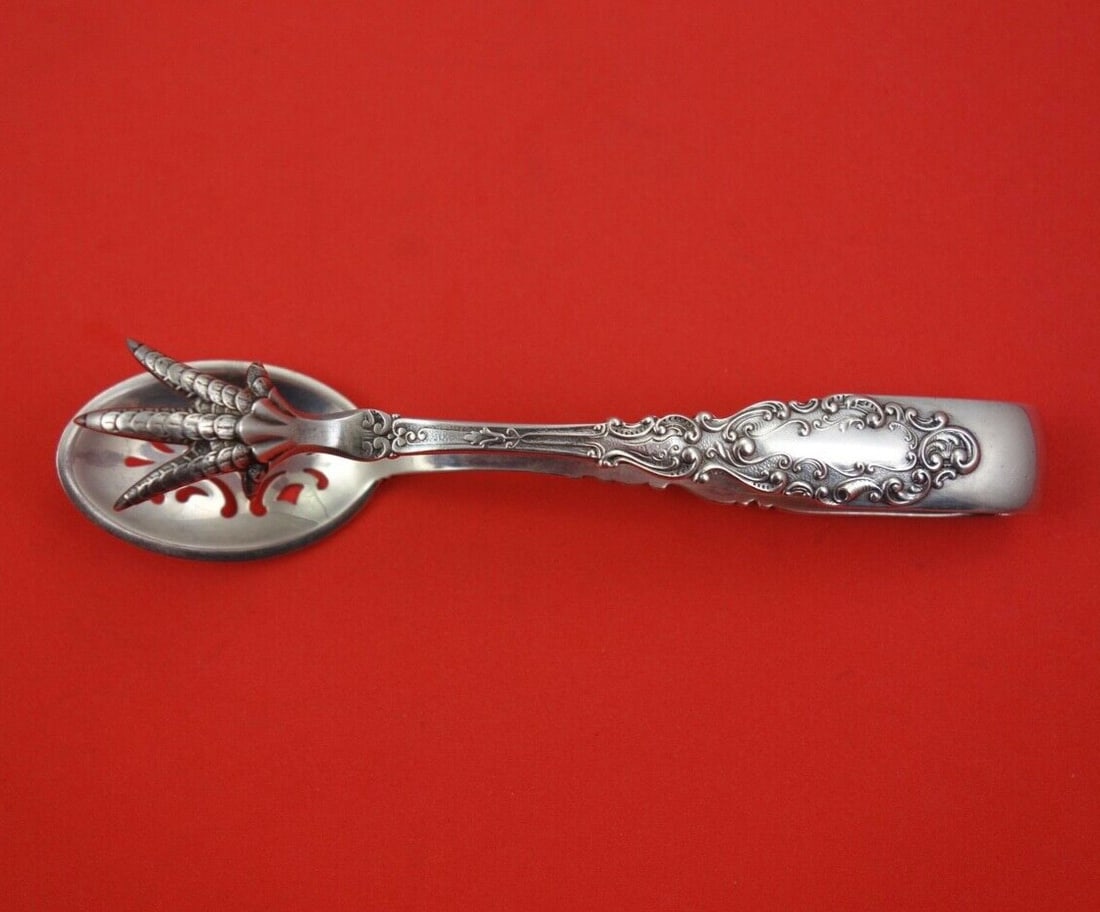 Gorham Luxembourg Sterling Silver Ice Tong 5 Inch Monogrammed: Gorham Luxembourg Sterling Silver Ice Tong 5 Inch Monogrammed This exquisite ice tong from the Luxembourg pattern by Gorham showcases a unique design featuring a pierced spoon and claw detail. Crafted