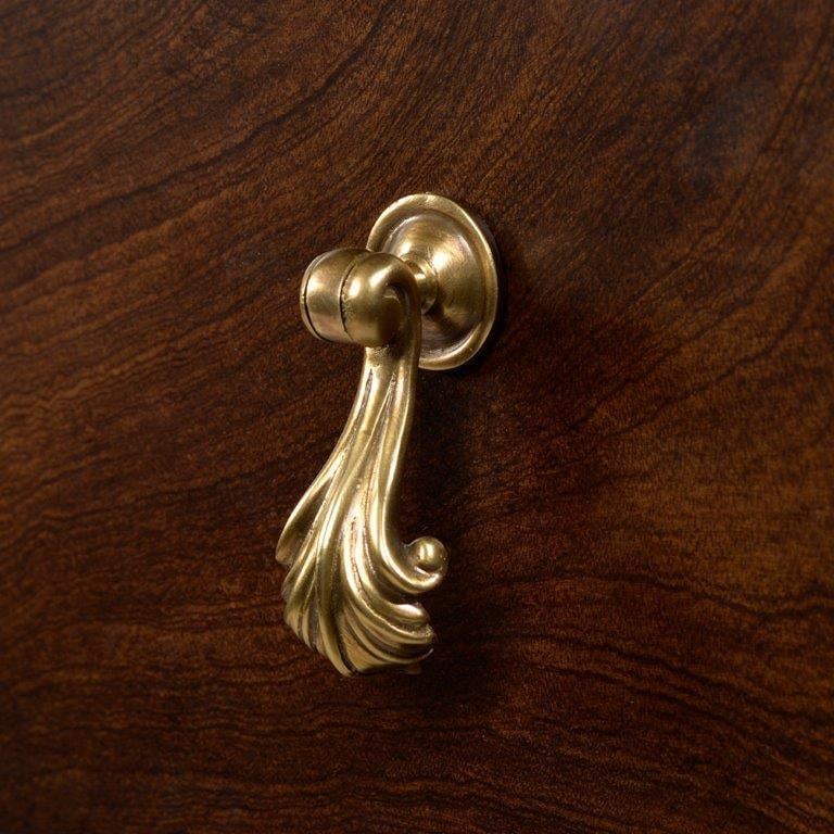 Oliver Home Art Deco Mahogany Chest with Blue Syrup Finish: Oliver Home Art Deco Mahogany Chest with Blue Syrup Finish This Art Deco Inspired Hand-Crafted Mahogany Chest combines timeless elegance with modern functionality. Designed with a stylish bowfront sha