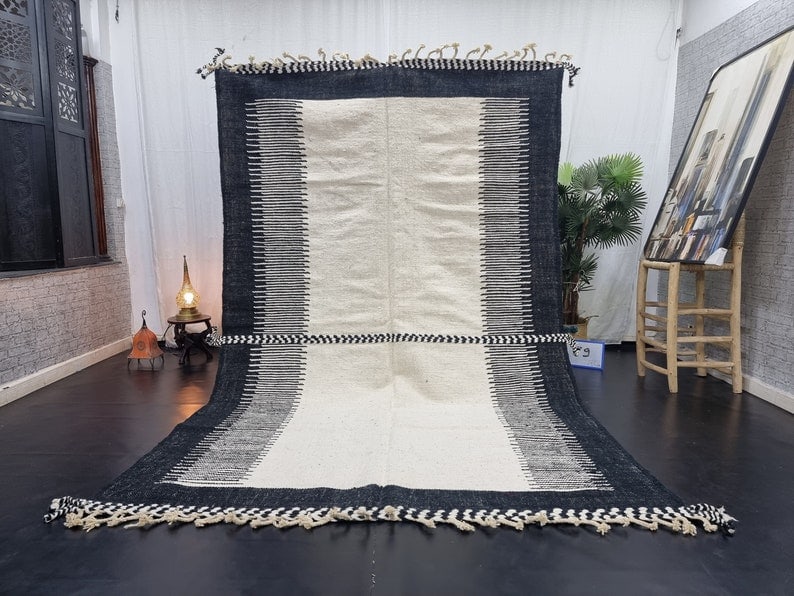 Authentic Handmade Moroccan Berber Rug 100% Sheep Wool 10 x 5 Feet: Authentic Handmade Moroccan Berber Rug 100% Sheep Wool 10 x 5 Feet Experience the beauty of authentic craftsmanship with this stunning handwoven Moroccan Berber rug. Meticulously crafted by local Berb