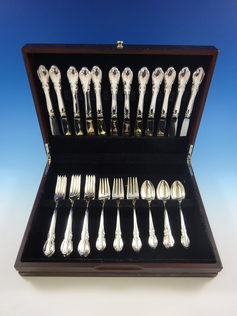Towle Legato Sterling Silver Flatware Set 48 Pieces for 12 with Storage Chest: Towle Legato Sterling Silver Flatware Set 48 Pieces for 12 with Storage Chest Elevate your dining experience with the Legato by Towle Sterling Silver Flatware Set, designed for service for 12. This ex