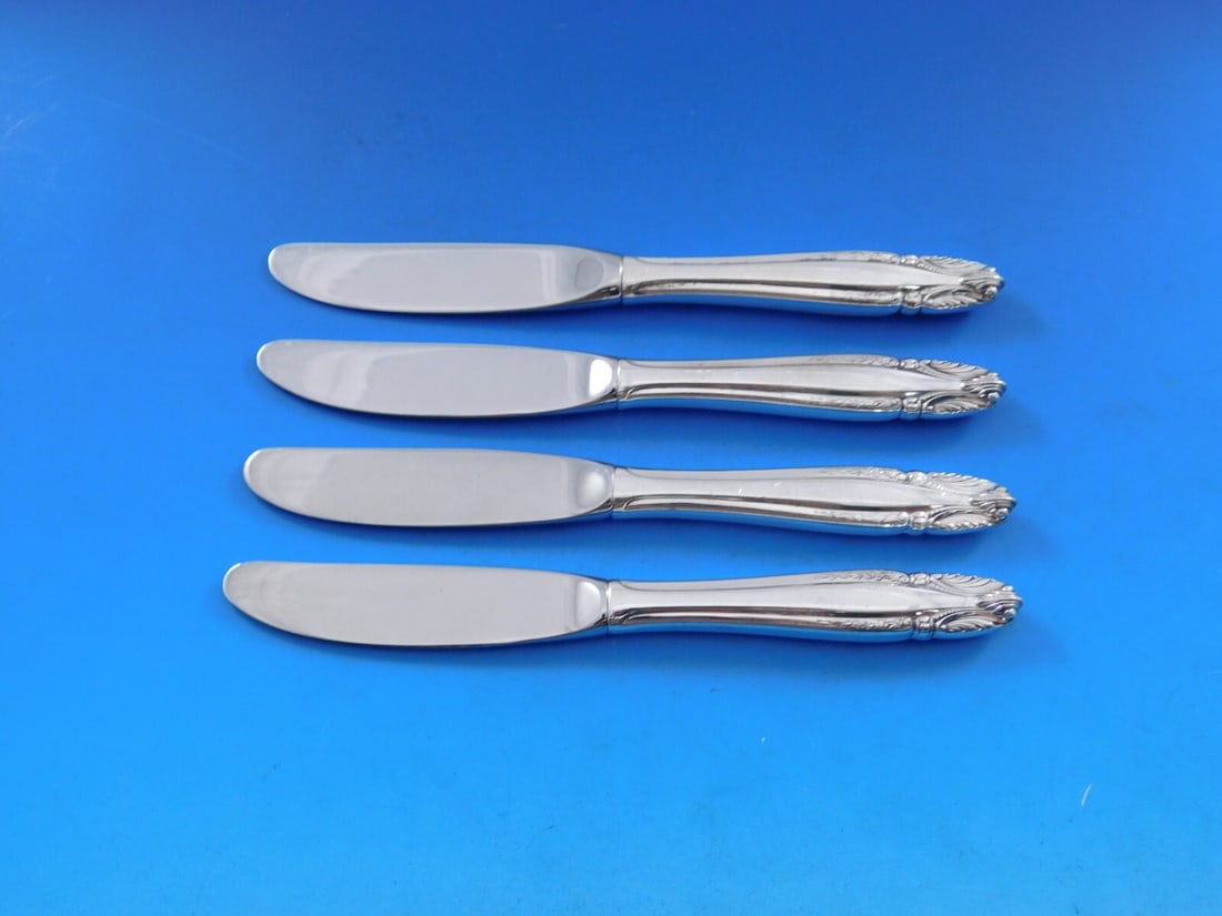 Wallace Stradivari Sterling Silver Butter Spreader Set of 4 6 1/4": Wallace Stradivari Sterling Silver Butter Spreader Set of 4 6 1/4" Enhance your dining experience with this exquisite set of 4 butter spreaders from the Stradivari pattern by Wallace. Each spreader fe