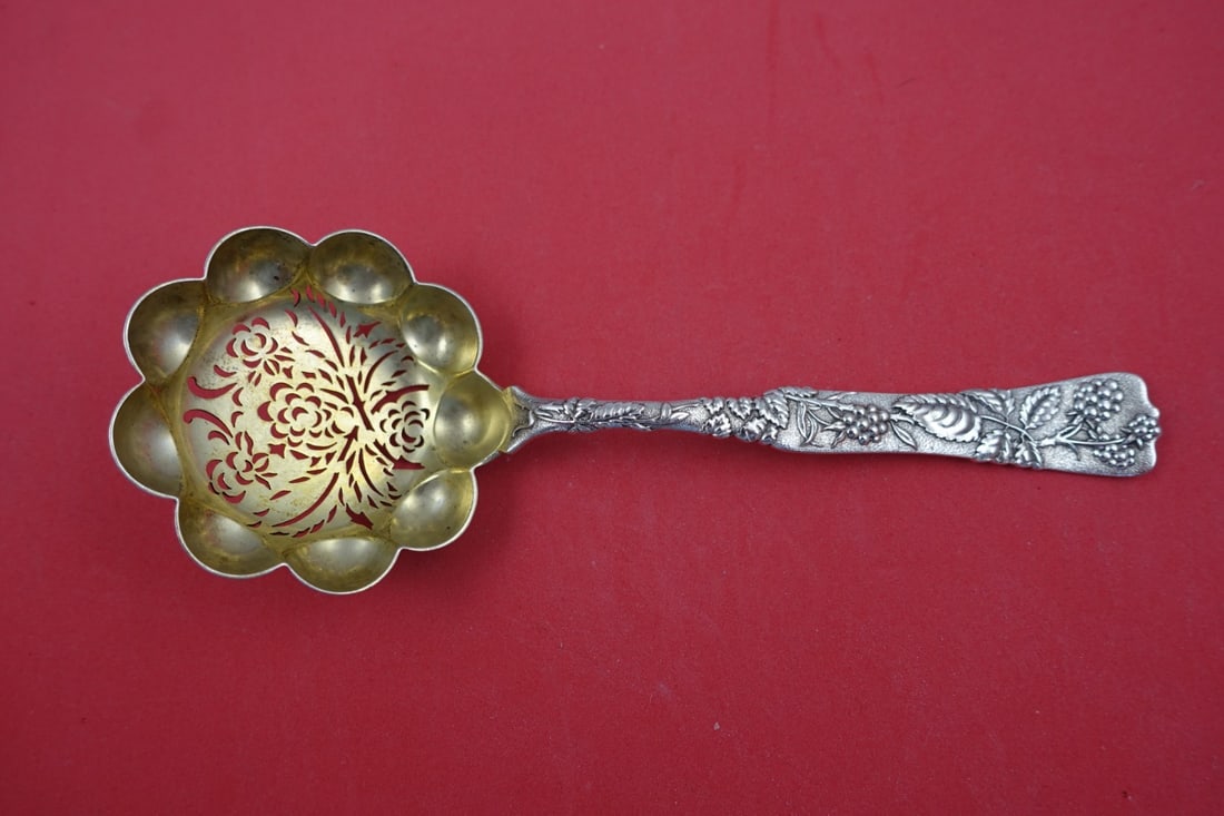 Tiffany & Co. Vine Sterling Silver Sugar Sifter Gold Washed 7.5" Raspberry Motif: Tiffany & Co. Vine Sterling Silver Sugar Sifter Gold Washed 7.5" Raspberry Motif Introducing the Vine by Tiffany & Co. Sterling Silver Sugar Sifter, featuring a charming raspberry motif. This exquisit