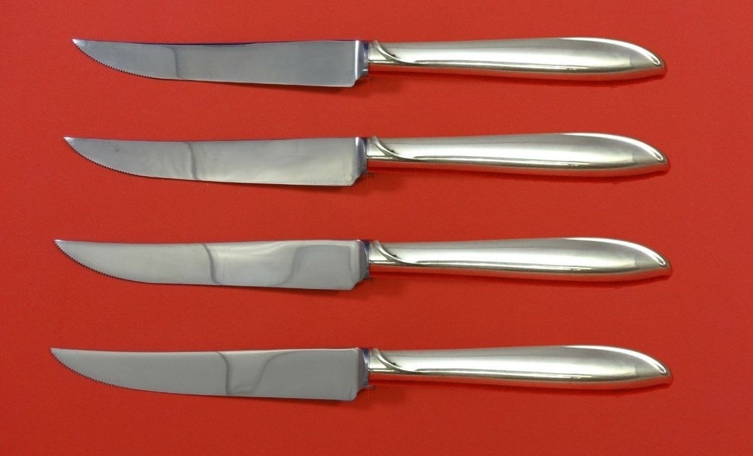 International Sterling Silver Silver Rhythm Steak Knife Set 4pc Custom: International Sterling Silver Silver Rhythm Steak Knife Set 4pc Custom Enhance your dining experience with this exquisite 4-piece steak knife set from the Silver Rhythm pattern by International Sterli