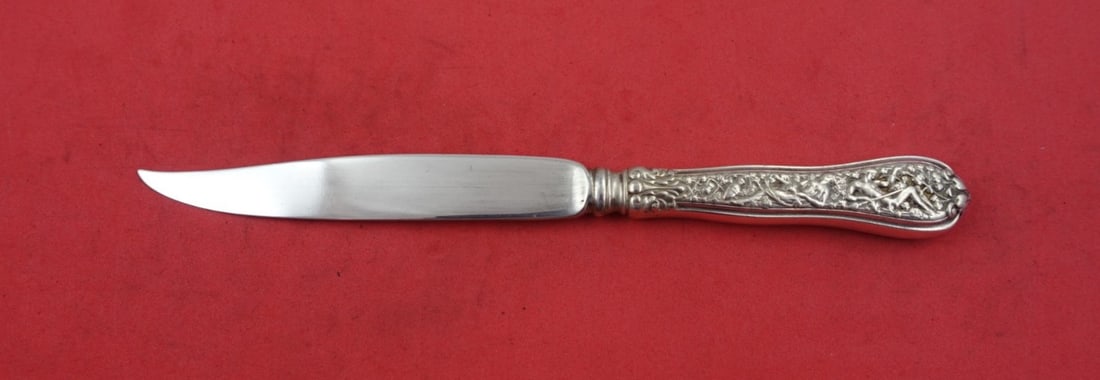 Tiffany & Co Olympian Sterling Silver Fruit Knife 7.5": Tiffany & Co Olympian Sterling Silver Fruit Knife 7.5" This exquisite fruit knife from the Olympian pattern by Tiffany & Co. is crafted from high-quality sterling silver. Measuring 7 1/2 inches, this
