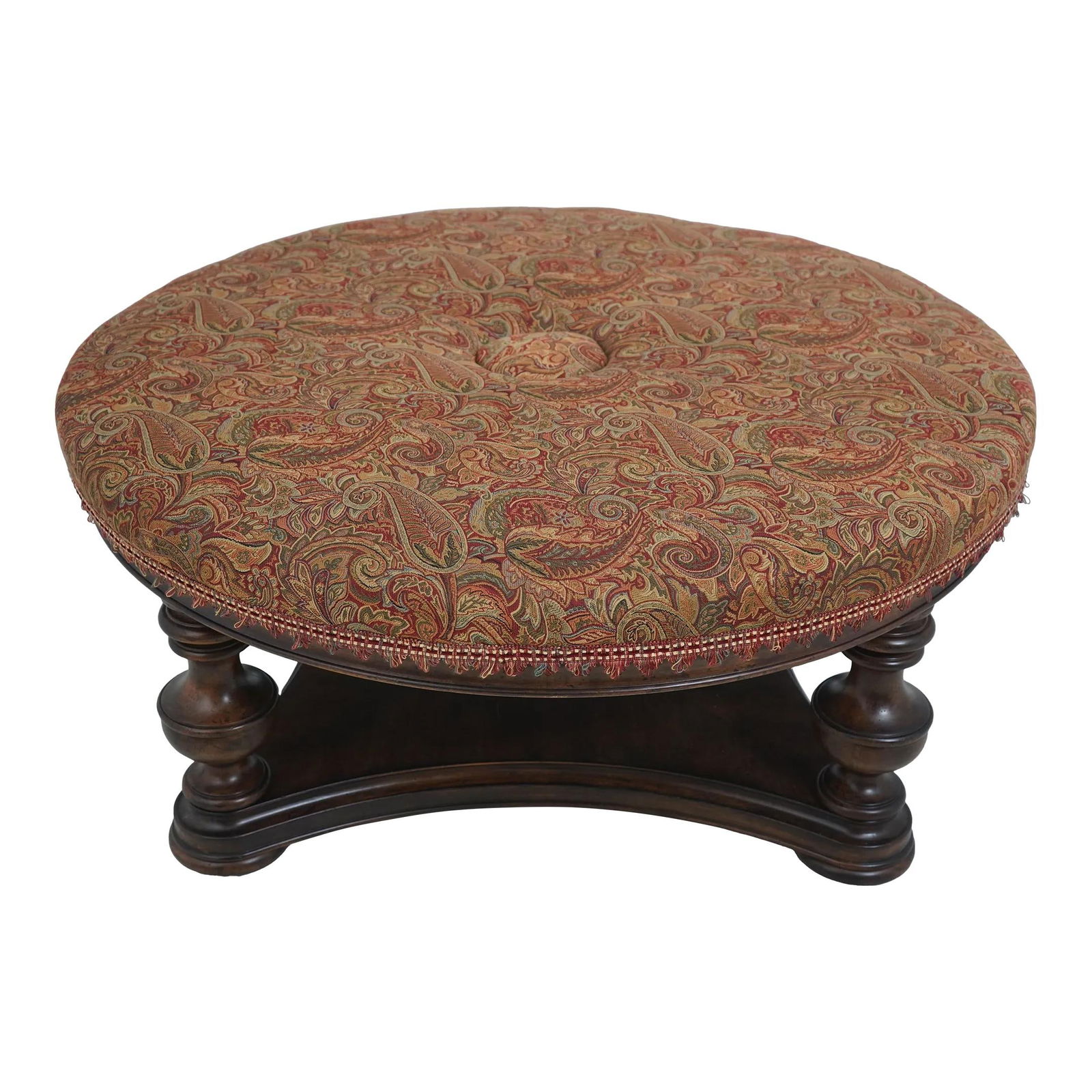 Large Round Walnut Upholstered Ottoman Coffee Table with Tassel Trim: Large Round Walnut Upholstered Ottoman Coffee Table with Tassel Trim This stunning large round upholstered ottoman coffee table showcases a beautiful walnut finish and is designed for versatile use as