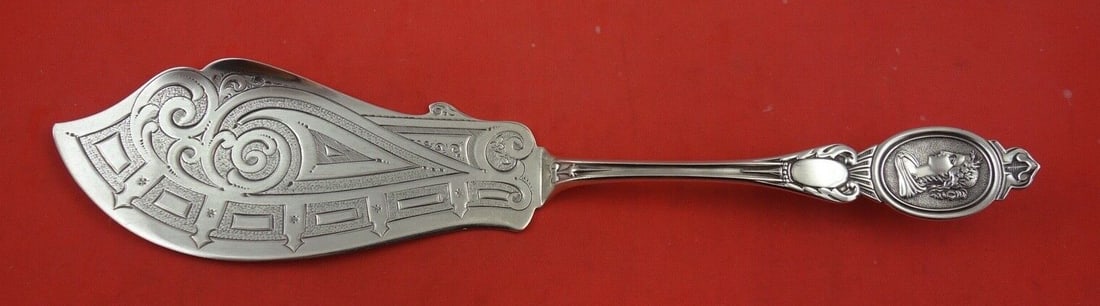 John H. Westervelt Sterling Silver Medallion Ice Cream Slice 11.5": John H. Westervelt Sterling Silver Medallion Ice Cream Slice 11.5" This exquisite ice cream slice, crafted by John H. Westervelt, showcases the elegant Medallion pattern in bright-cut design. Made fro