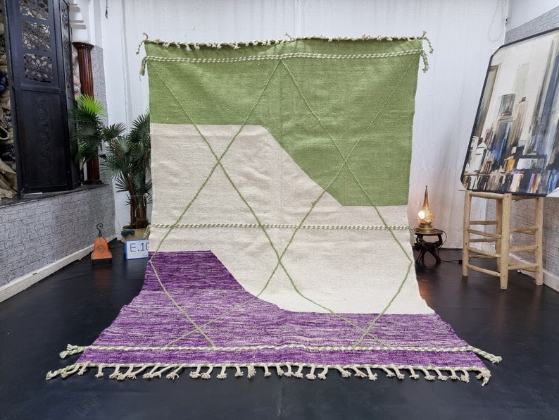 Colorful Handmade Moroccan Berber Wool Area Rug 9.84 x 6.56 Feet: Colorful Handmade Moroccan Berber Wool Area Rug 9.84 x 6.56 Feet This elegant and colorful handmade Moroccan Berber wool area rug showcases exquisite craftsmanship. Handwoven in the Atlas Mountains by