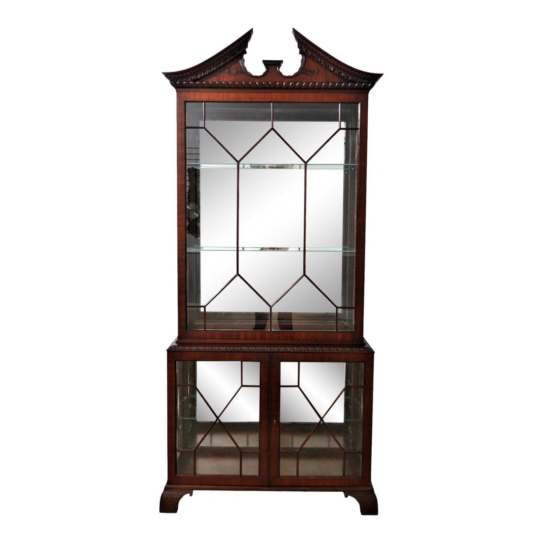 Vintage 1920s Chinese Chippendale Mahogany Display Cabinet: Vintage 1920s Chinese Chippendale Mahogany Display Cabinet Discover this impressive Master Craftsman Chinese Chippendale mahogany display cabinet, crafted in the 1920s. This vintage cabinet features f