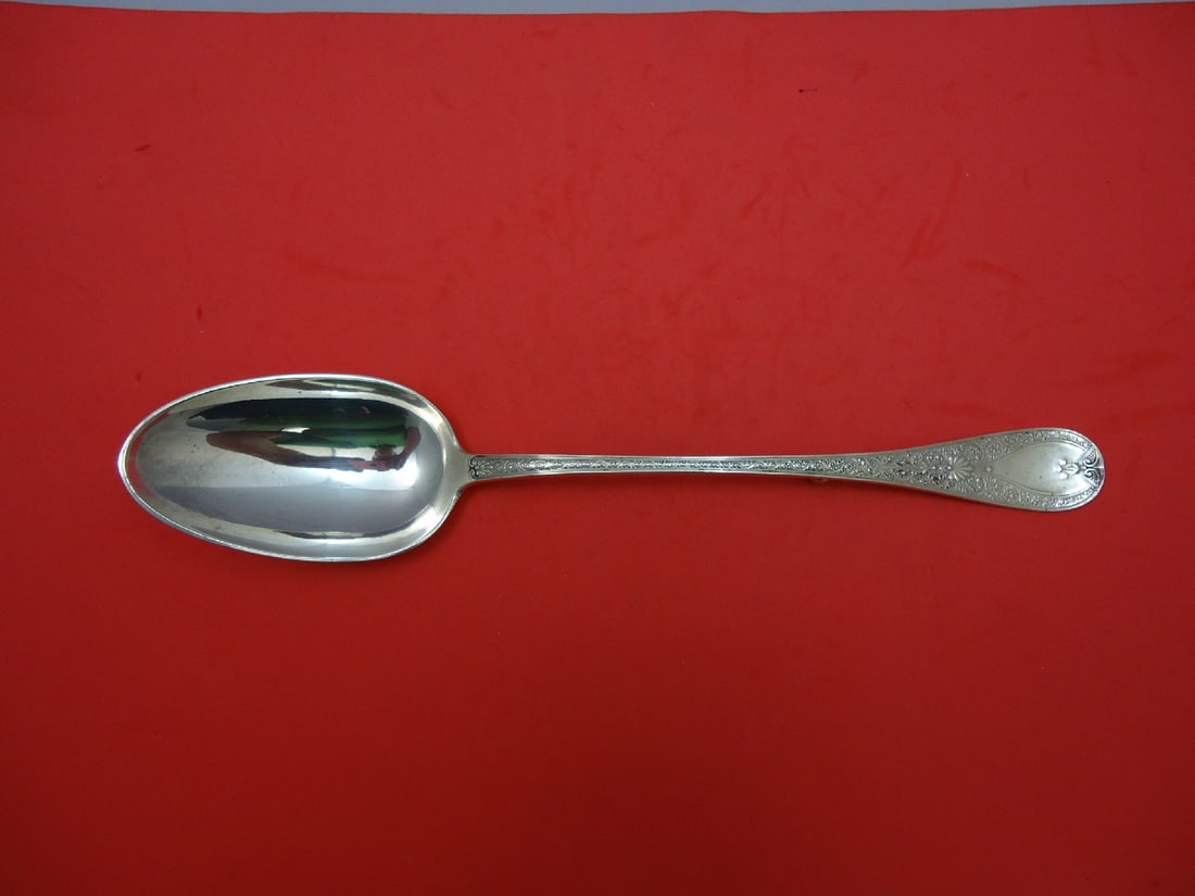 Durgin Sterling Silver Ornate Stuffing Spoon 12 Inch: Durgin Sterling Silver Ornate Stuffing Spoon 12 Inch This exquisite Durgin Sterling Silver Stuffing Spoon features a classic button design and measures 12 inches in length. Crafted from high-quality s