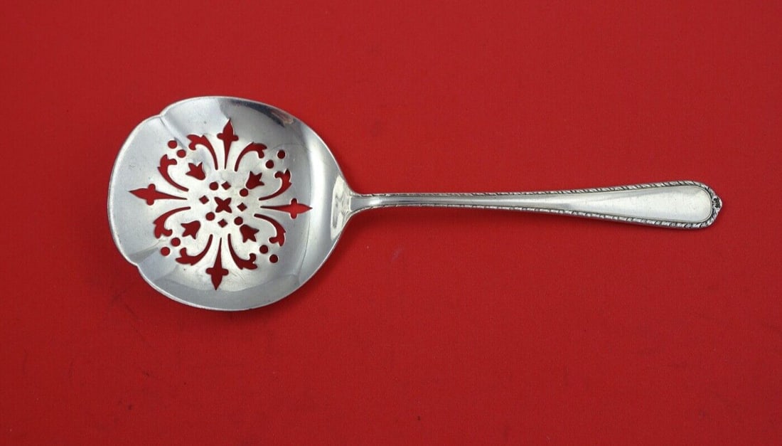 International Sterling Silver Pine Tree Cucumber Server Pierced 5 1/4": International Sterling Silver Pine Tree Cucumber Server Pierced 5 1/4" Crafted by International Silver, this exquisite Pine Tree Cucumber Server is made of high-quality sterling silver. With a pierced