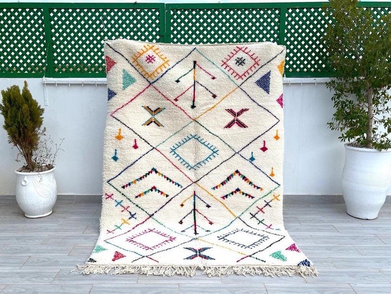 Authentic Beige Handmade Moroccan Berber Wool Rug 3.28 x 5 Feet: Authentic Beige Handmade Moroccan Berber Wool Rug 3.28 x 5 Feet Discover the beauty of this elegant, authentic beige handmade Moroccan Berber wool rug. Handwoven by local Berber women weavers in the A