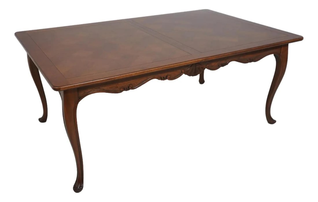 Oak Parquet Extension Dining Table with Two Leaves in French Louis XV Style: Oak Parquet Extension Dining Table with Two Leaves in French Louis XV Style This French Louis XV style extension dining table features fine carved details and a parquetry oak top. Crafted with high qu