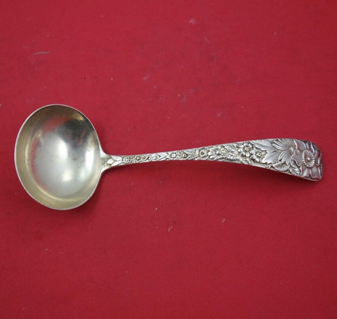 Durgin Bouquet Sterling Silver Gravy Ladle 7 3/8 Inches: Durgin Bouquet Sterling Silver Gravy Ladle 7 3/8 Inches This exquisite gravy ladle from Durgin's renowned Bouquet pattern features a beautiful multi-motif design, crafted from high-quality sterling si
