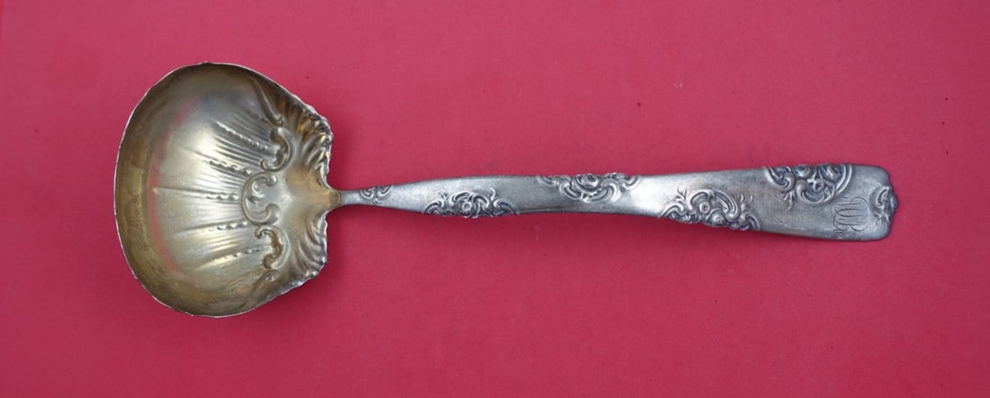 Whiting Sterling Silver 11" Rose and Scroll Oyster Ladle: Whiting Sterling Silver 11" Rose and Scroll Oyster Ladle This exquisite ladle from the renowned Whiting brand features the elegant "Rose and Scroll" pattern, crafted from high-quality sterling silver.