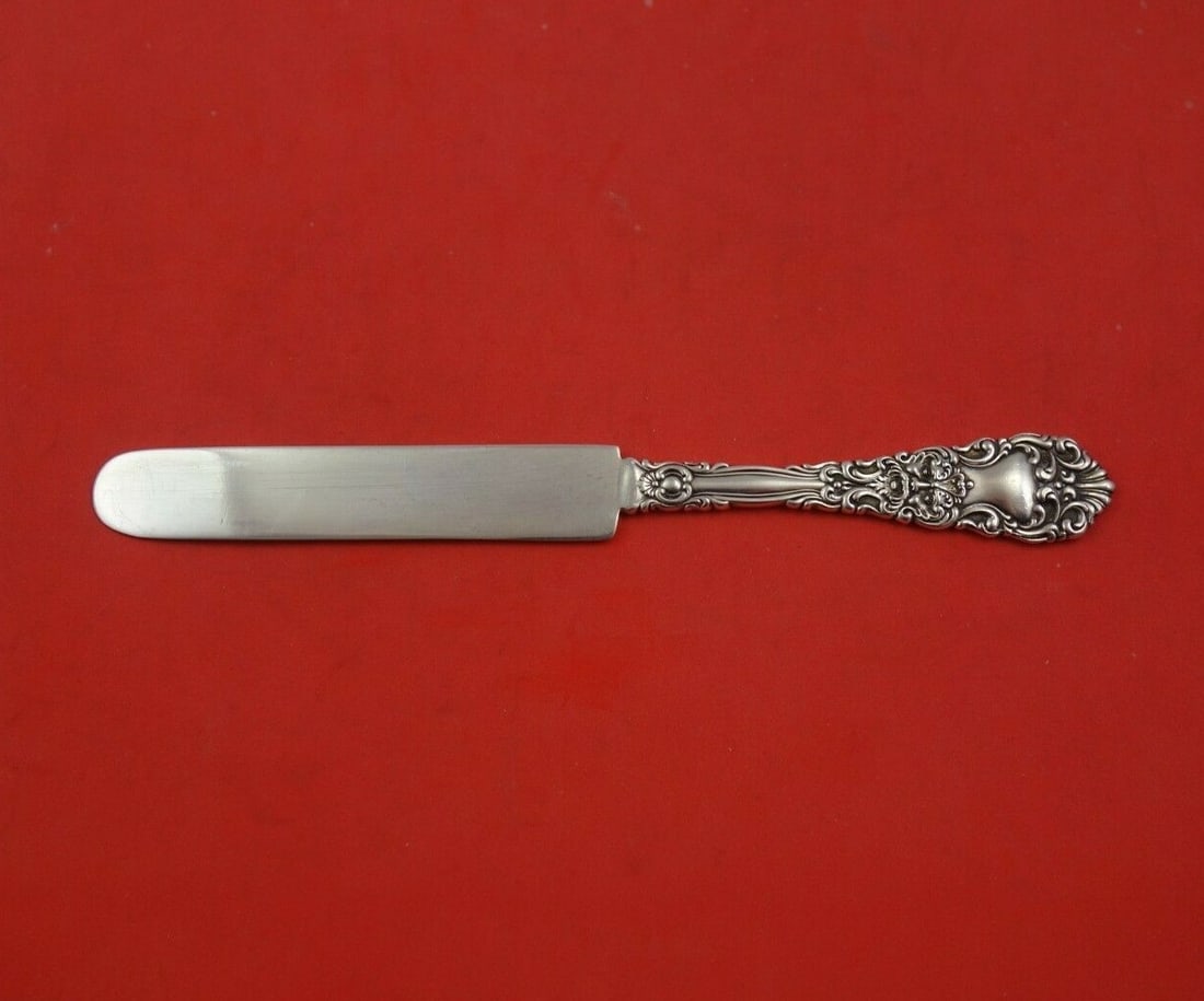 Dominick & Haff Renaissance Sterling Silver Dessert Knife 7 1/8": Dominick & Haff Renaissance Sterling Silver Dessert Knife 7 1/8" This exquisite dessert knife from the Renaissance pattern by Dominick & Haff showcases elegant craftsmanship in sterling silver. Measur