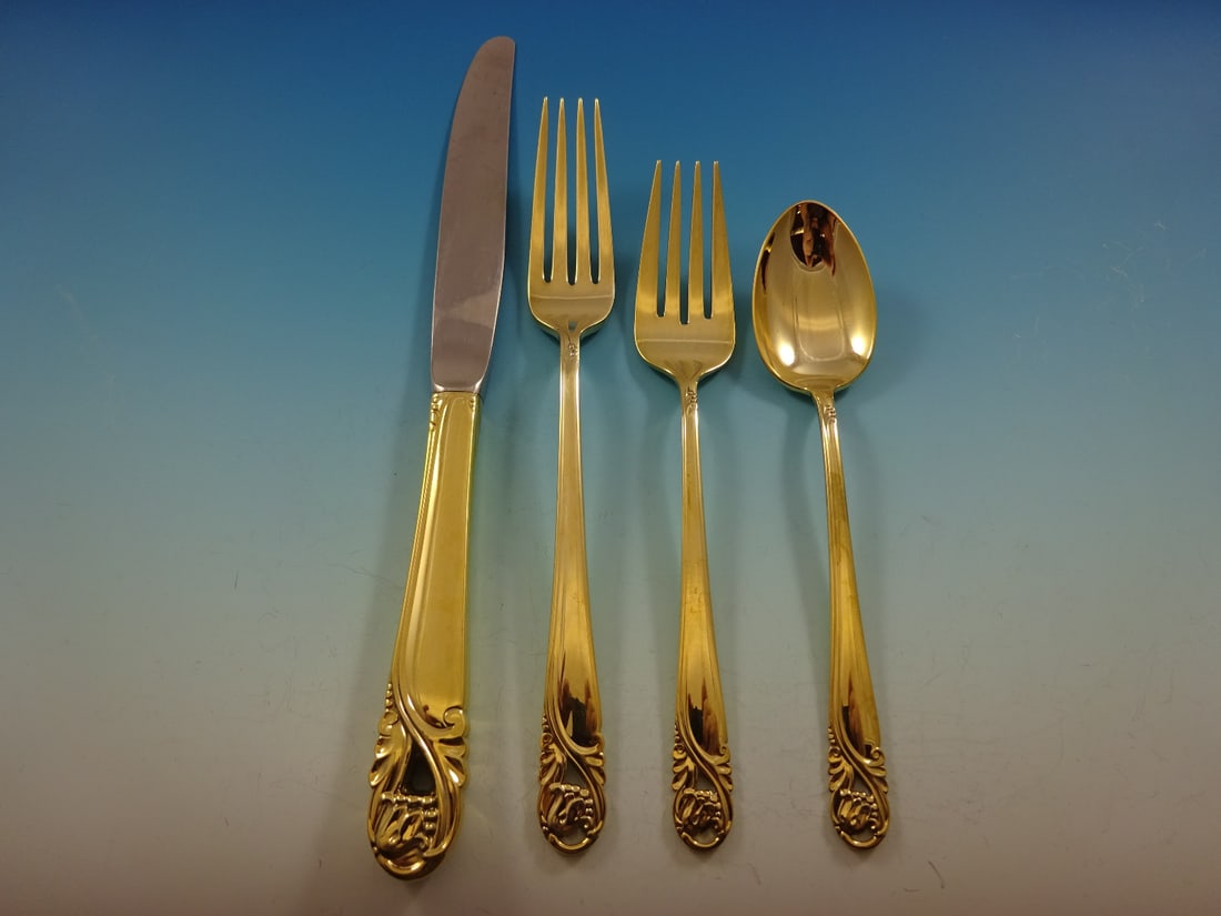 International Sterling Spring Glory Gold Flatware Set for 12 with Storage Chest: International Sterling Spring Glory Gold Flatware Set for 12 with Storage Chest Enhance your dining experience with the stunning Spring Glory Gold flatware set by International Sterling. This exquisit