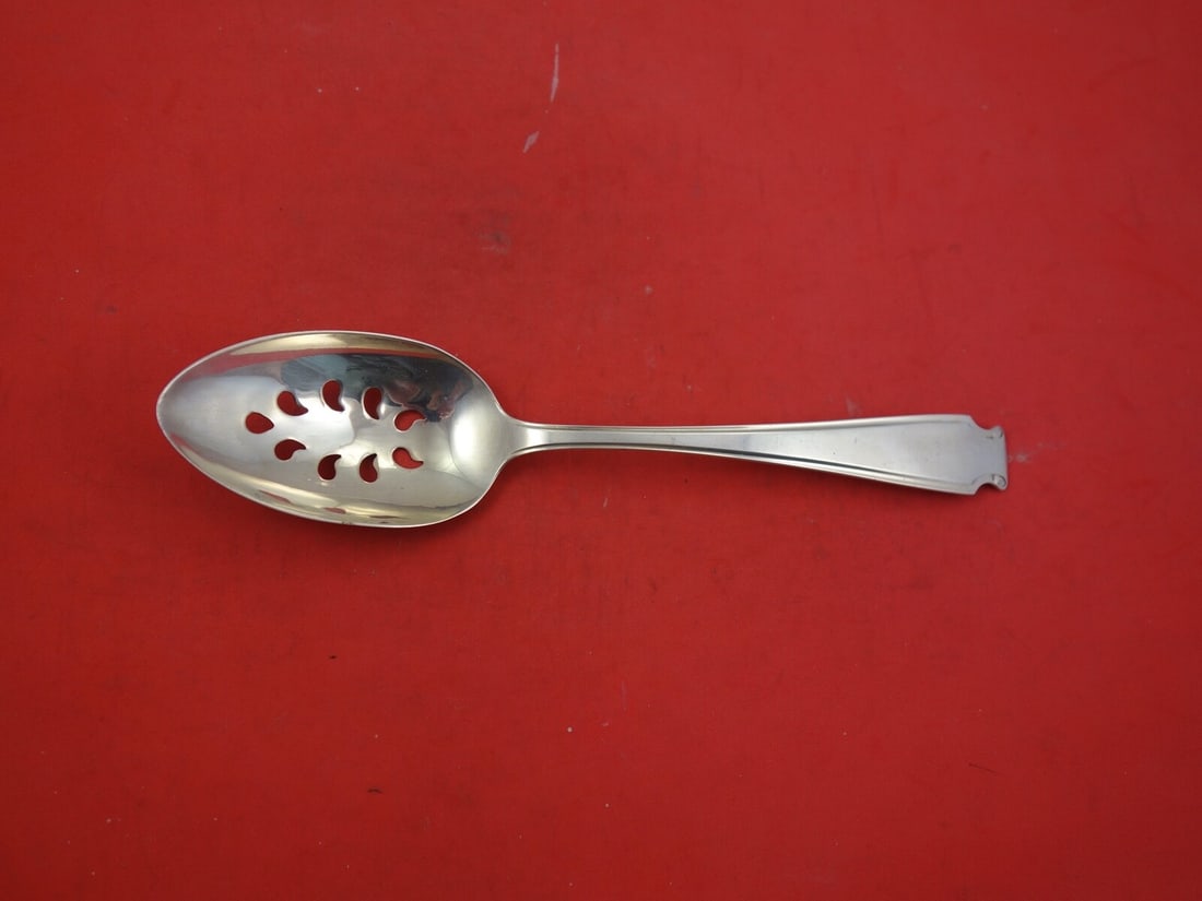 Whiting Saint Martins Sterling Silver Pierced Serving Spoon 8 1/4" 9-Hole: Whiting Saint Martins Sterling Silver Pierced Serving Spoon 8 1/4" 9-Hole This exquisite pierced serving spoon is crafted from sterling silver and features the elegant Saint Martins pattern by Whiting
