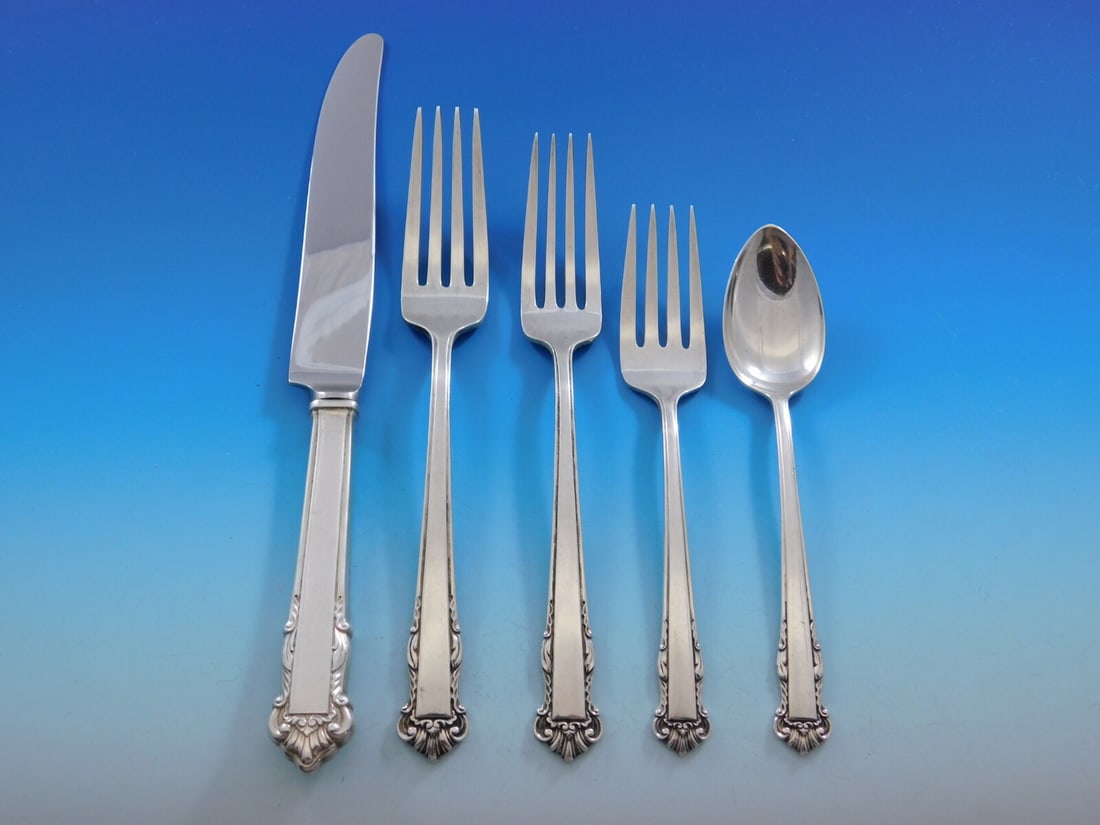 Lunt English Shell Sterling Silver Flatware Set for 12 - 63 Pieces: Lunt English Shell Sterling Silver Flatware Set for 12 - 63 Pieces Enhance your dining experience with this exquisite English Shell flatware set by Lunt, crafted from high-quality sterling silver. Thi