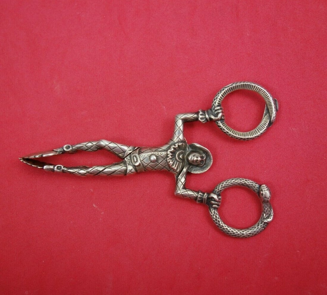 Gorham Sterling Silver Sugar Nips Jester Snake Handles 4 1/4": Gorham Sterling Silver Sugar Nips Jester Snake Handles 4 1/4" Enhance your tea or coffee service with these exquisite Gorham Sterling Silver Sugar Nips. Featuring unique jester performer and snake han