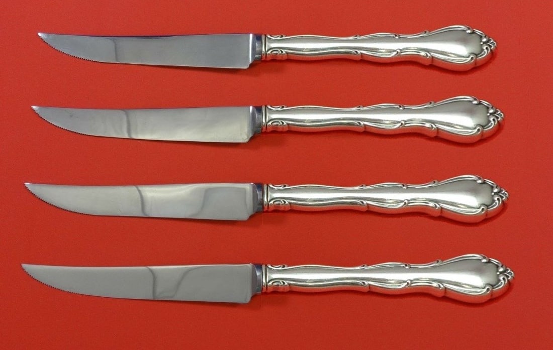Towle Fontana Sterling Silver Steak Knife Set 4pc Custom Made 8 1/2 inches: Towle Fontana Sterling Silver Steak Knife Set 4pc Custom Made 8 1/2 inches Enhance your dining experience with this exquisite Fontana by Towle Sterling Silver Steak Knife Set. This 4-piece set feature