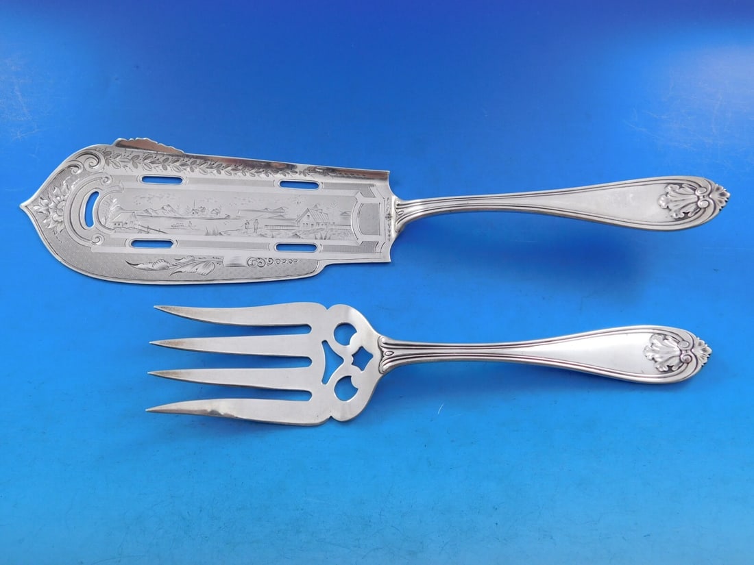 Albert Coles Leaf Pattern Coin Silver Fish Serving Set: Albert Coles Leaf Pattern Coin Silver Fish Serving Set This exquisite fish serving set, crafted by Albert Coles, showcases the intricate Leaf pattern also known as Shell. Made from coin silver, the se