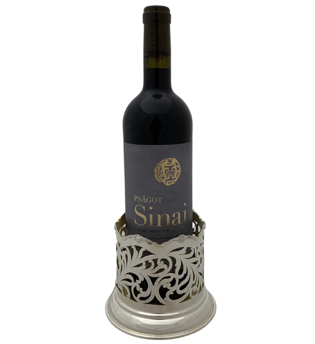 Handmade 925 Sterling Silver Ornate Bottle Holder 4.25 Inches: Handmade 925 Sterling Silver Ornate Bottle Holder 4.25 Inches This exquisite handmade bottle holder is crafted from fine 925 sterling silver, showcasing intricate cut out open chased swirl designs tha