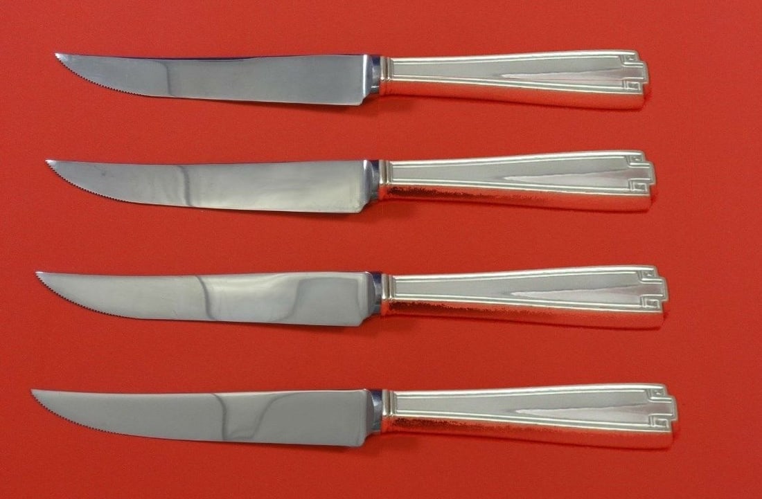 Gorham Etruscan Sterling Silver Steak Knife Set 4pc Custom Made 8.5": Gorham Etruscan Sterling Silver Steak Knife Set 4pc Custom Made 8.5" This exquisite 4-piece steak knife set features the elegant Etruscan pattern by Gorham, crafted from sterling silver. Each knife bo
