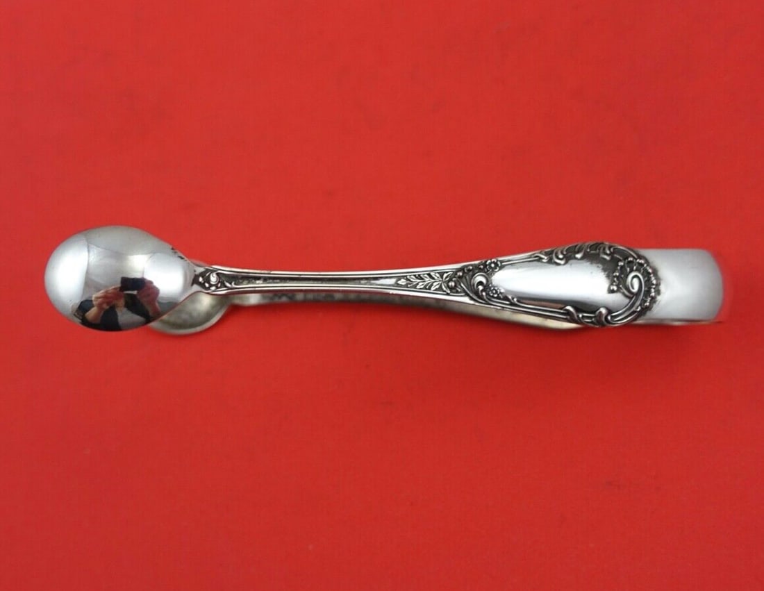 Dominick & Haff Louis XIV Sterling Silver Sugar Tong 4 7/8": Dominick & Haff Louis XIV Sterling Silver Sugar Tong 4 7/8" This exquisite sugar tong features the elegant Louis XIV Old Style pattern, crafted by Dominick & Haff from high-quality sterling silver. Me