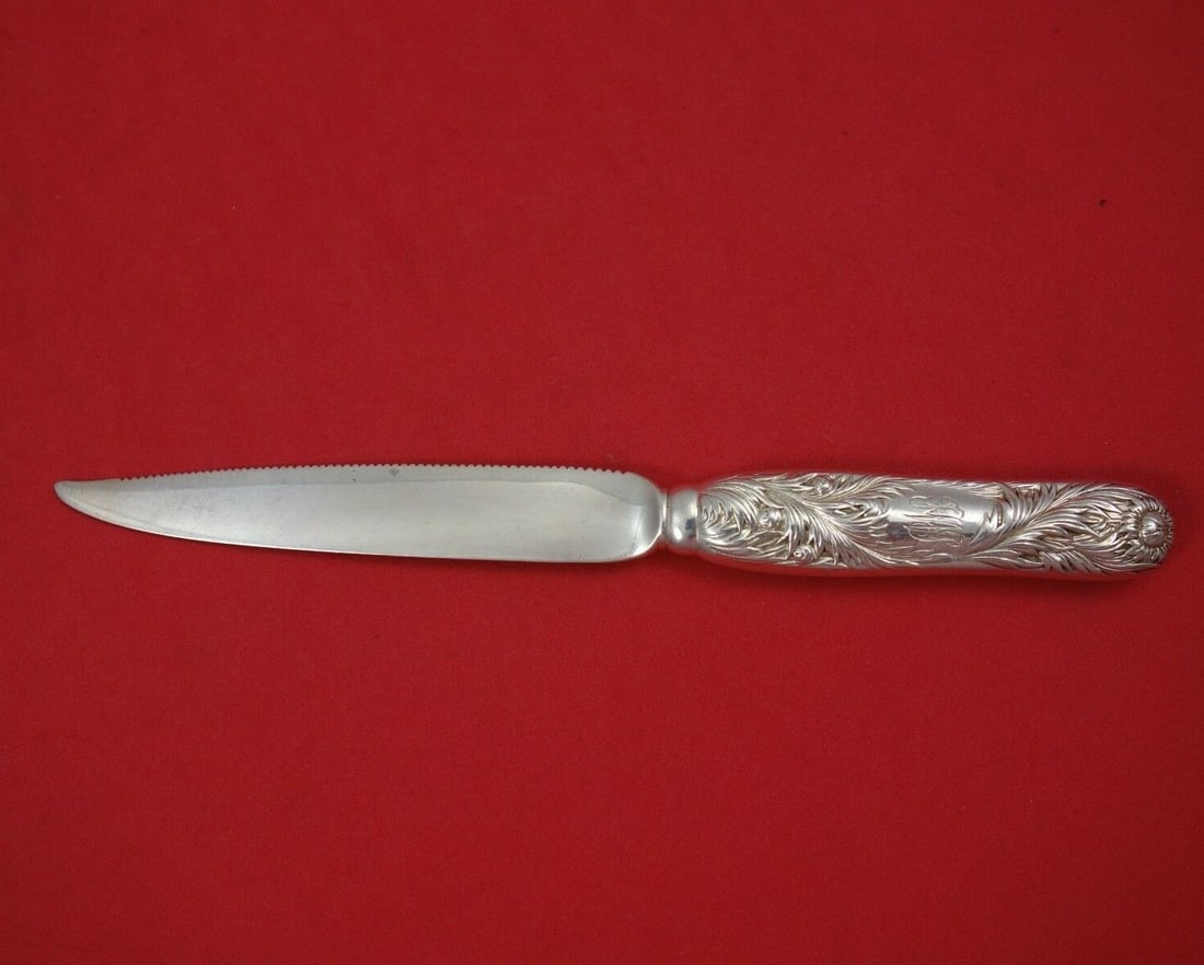 Tiffany & Co Chrysanthemum Sterling Silver Serrated Citrus Knife: Tiffany & Co Chrysanthemum Sterling Silver Serrated Citrus Knife This exquisite citrus knife, crafted by Tiffany & Co. in the iconic Chrysanthemum pattern, showcases the elegance of sterling silver fr