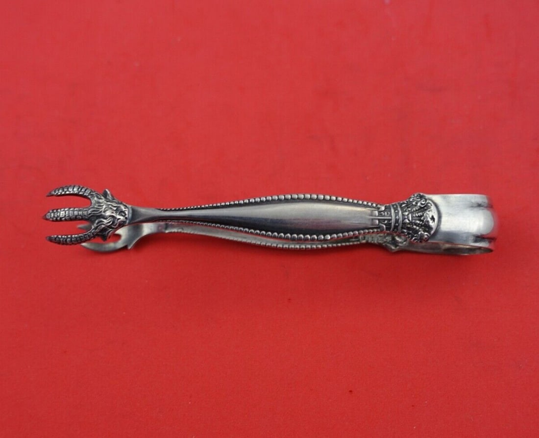 Shiebler Sandringham Sterling Silver Sugar Tong 4 5/8 Inch Serving Piece: Shiebler Sandringham Sterling Silver Sugar Tong 4 5/8 Inch Serving Piece This exquisite sugar tong, measuring 4 5/8 inches, showcases the elegant Sandringham pattern by Shiebler. Crafted from high-qua