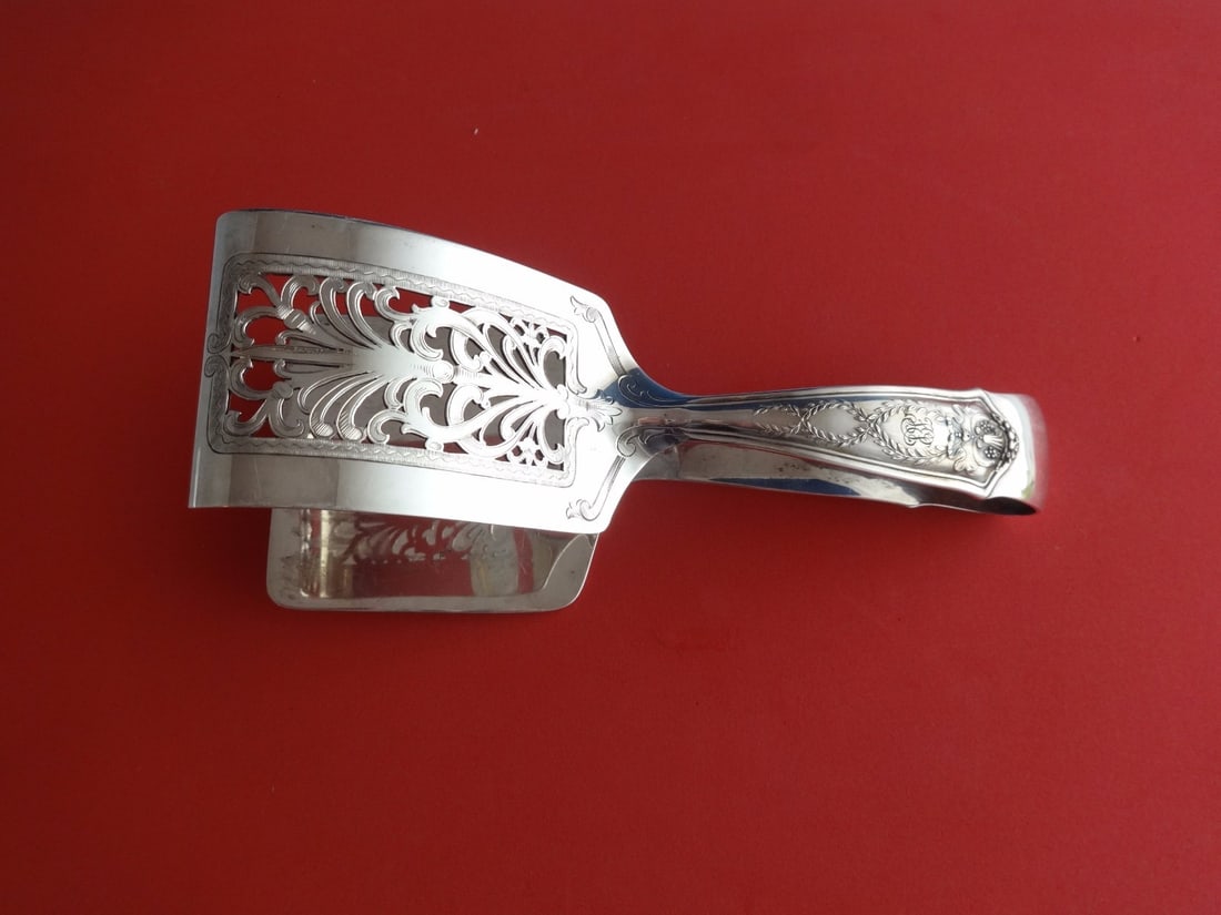 Tiffany & Co. Winthrop Sterling Silver Asparagus Tong 7.5" Monogrammed: Tiffany & Co. Winthrop Sterling Silver Asparagus Tong 7.5" Monogrammed This exquisite asparagus tong by Tiffany & Co. showcases the elegant Winthrop pattern, crafted from high-quality sterling silver.