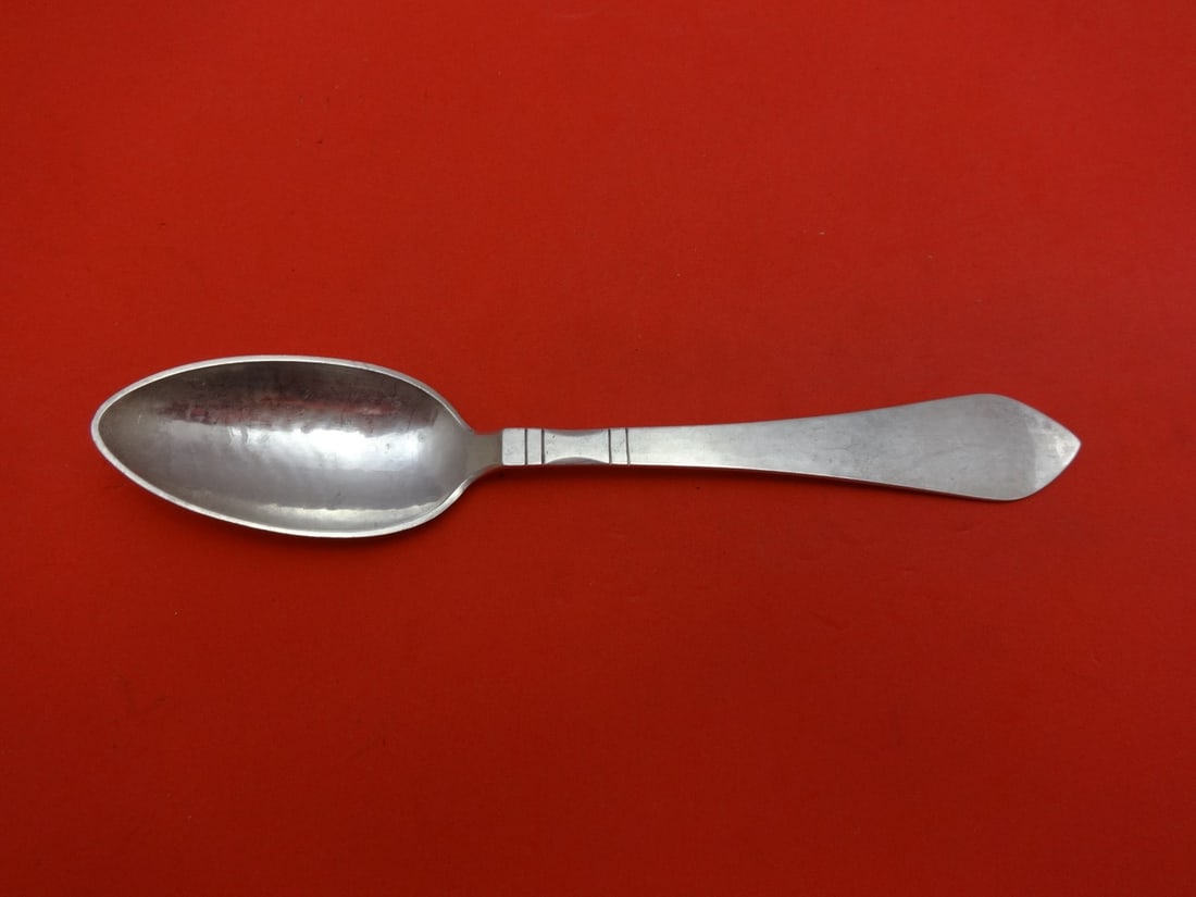 Georg Jensen Continental Sterling Silver Grapefruit Spoon 5 7/8": Georg Jensen Continental Sterling Silver Grapefruit Spoon 5 7/8" This exquisite grapefruit spoon is a part of the Continental pattern by Georg Jensen, crafted from high-quality sterling silver. Measur