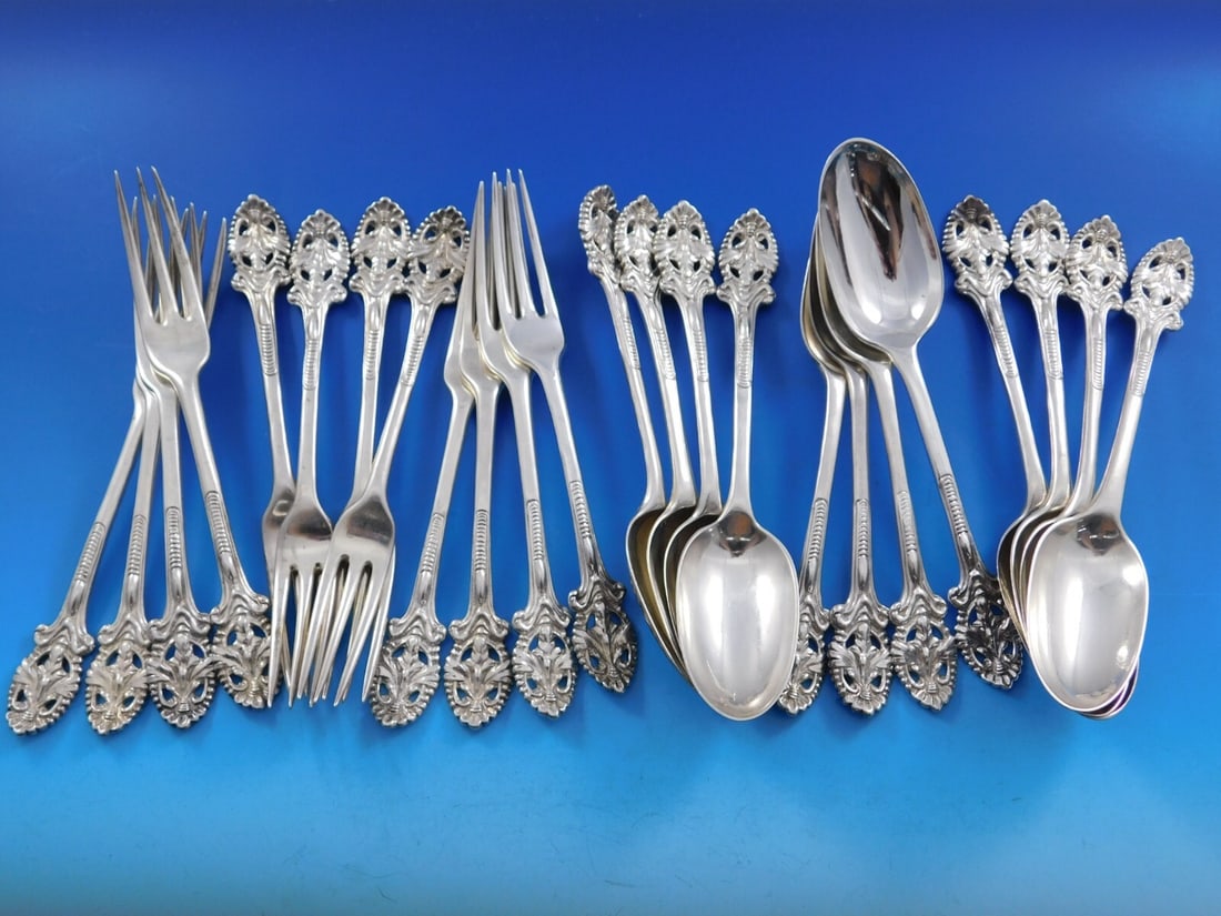 English Georgian Sterling Silver Dessert Set 24 Pieces London 1761-1778: English Georgian Sterling Silver Dessert Set 24 Pieces London 1761-1778 This exquisite English Georgian Sterling Silver Flatware Dessert Set features a classic pierced leaf motif design. Crafted in Lo